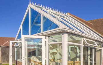 conservatory roof insulation costs Kensal Town